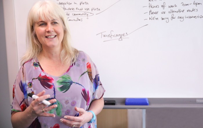 Angela Bensemann at whiteboard